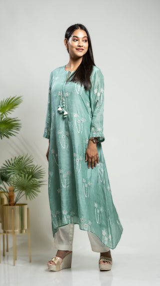 Pastel green muslin silk asymmetrical kurta with mokash highlights.