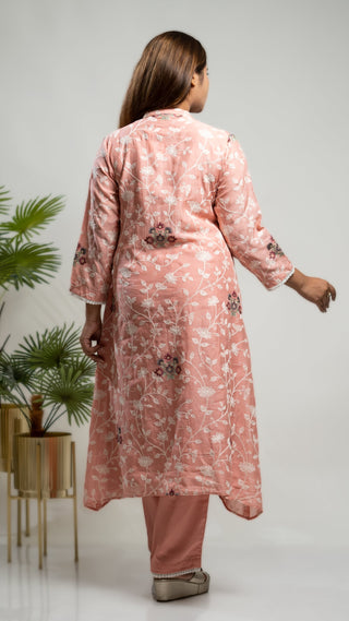 Onion pink cross-stitch kurta set with embroidery and matching pants.