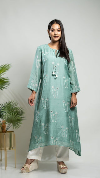 Pastel green muslin silk asymmetrical kurta with mokash highlight.