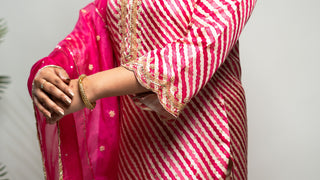 Pink Leheriya Printed Kurta with gold weave and embroidery, featuring sequins and pearls.