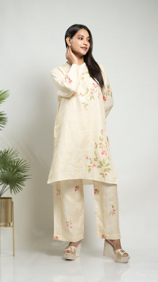 Pale yellow printed linen kurta and pant co-ord set.