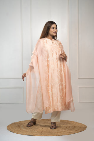 Powder pink Chanderi silk kurta with French knot embroidery and sequins, featuring a scalloped silk Kota dupatta.