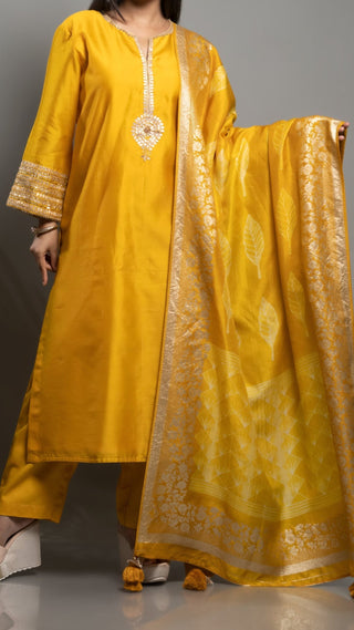 Mustard yellow gold weave set with Gota embroidery on chanderi silk and Banarasi dupatta.