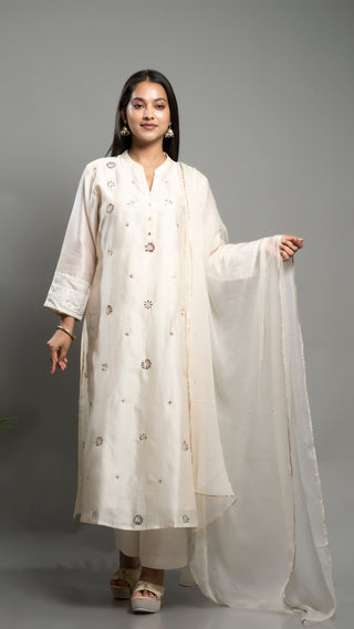 Off-white Chanderi silk kurta with mokash and kantha embroidery, paired with a chiffon dupatta featuring mokash trimming.